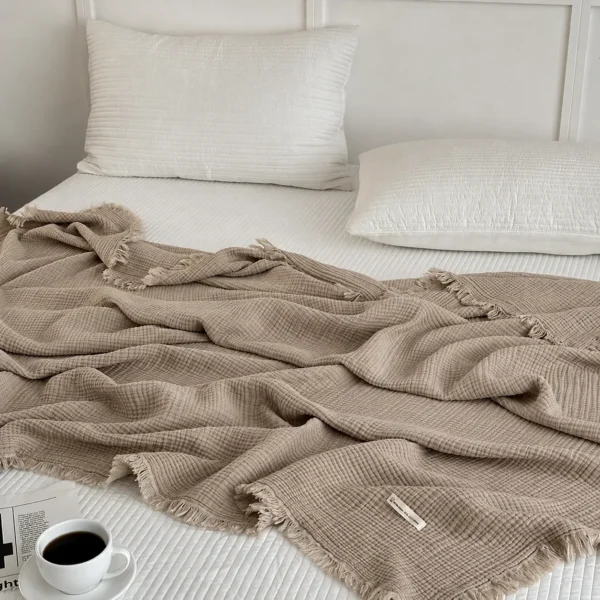 Layered cotton blanket for sofa relaxation and bedroom comfort