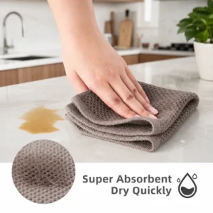 Minimalist cotton kitchen towels with textured honeycomb pattern