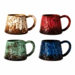 Glazed ceramic tea cups with comfortable handles and minimalist style