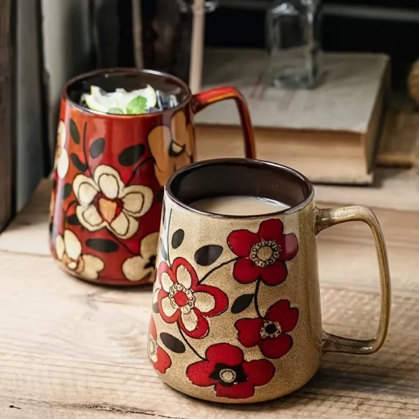 Decorative ceramic coffee mug with artistic floral design